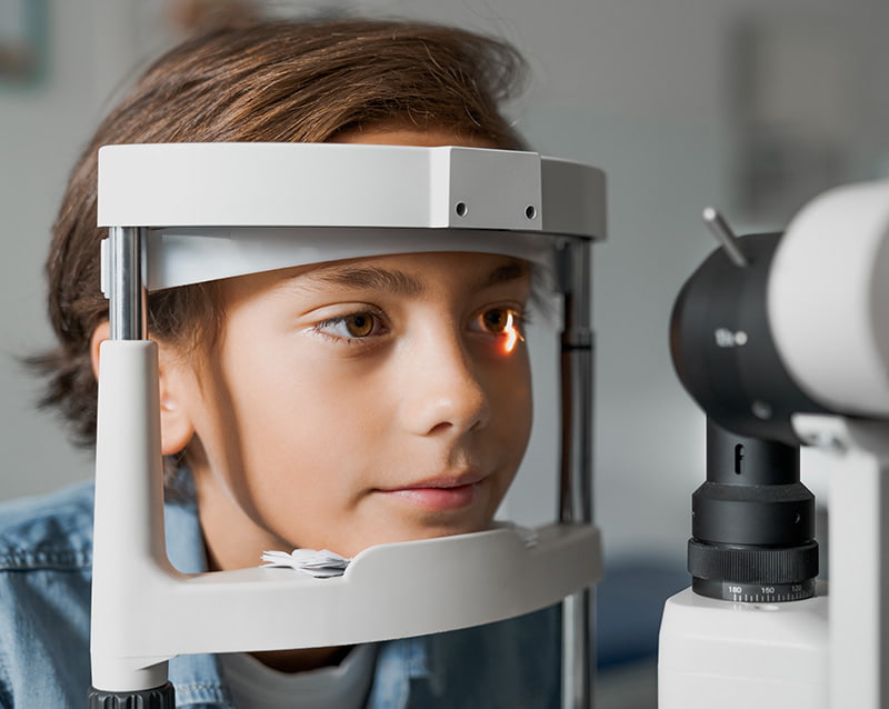 boy receiving an eye exam