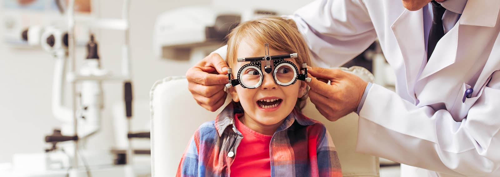 boy getting fitted for glasses